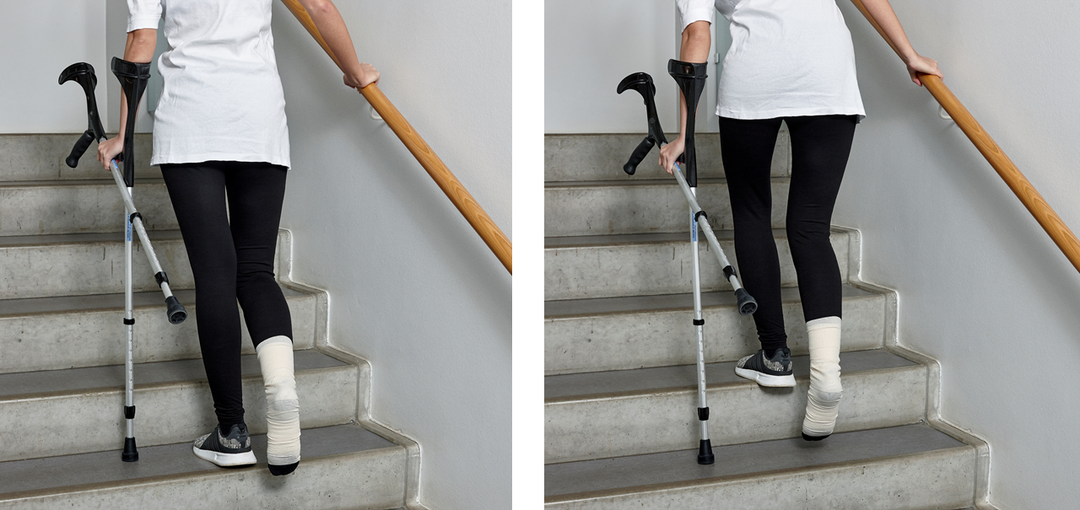 Picture of a person walking up the stairs with crutches