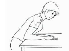 Billedet viser, at man skal hvile sin underarm på et bord.