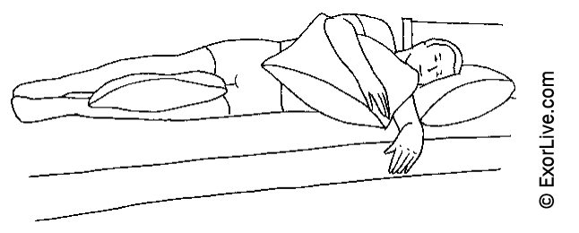 Illustration af, at man kan lægge en pude mellem benene.