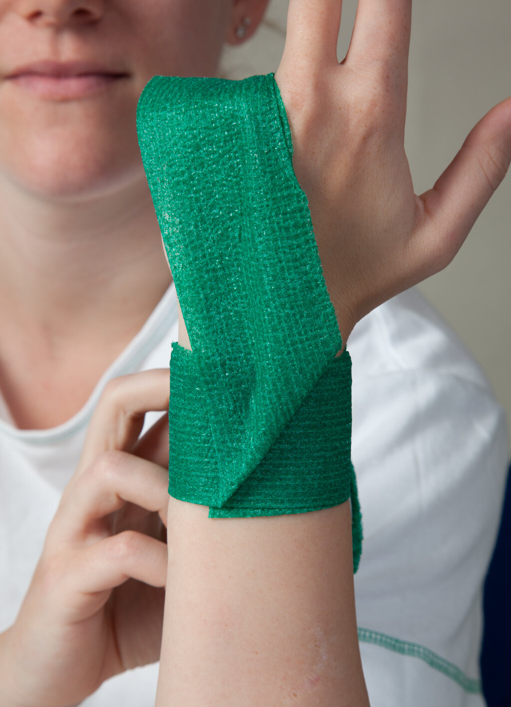 Fingerøvelse med elastikbind