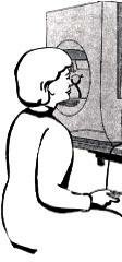 Illustration af patient, der er ved at få foretaget en synsfelt undersøgelse