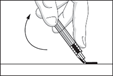 Tryk sikkerhedsnålen fladt mod en hård overflade indtil nålen er låst fast.